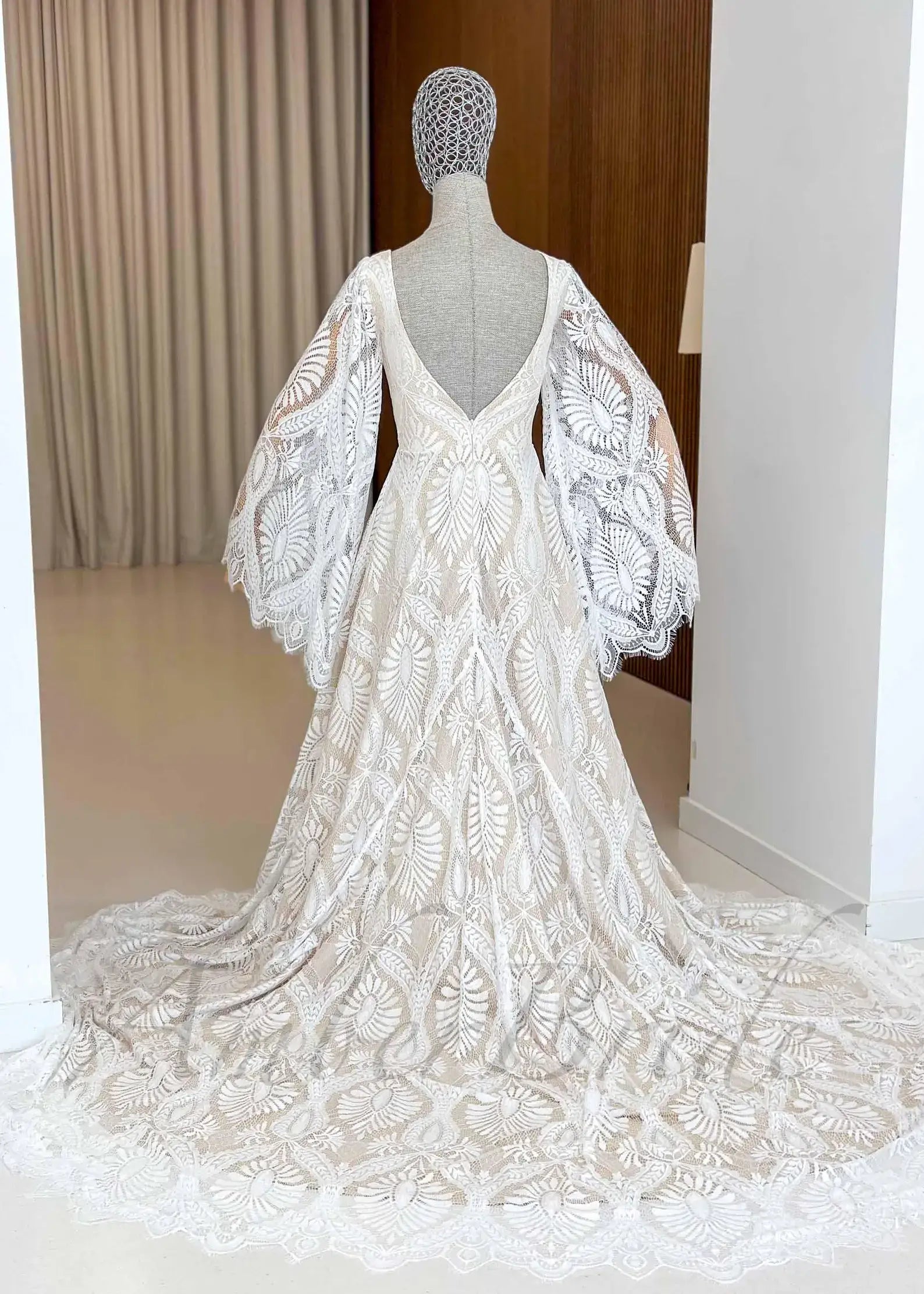 A-Line Lace Boho Wedding Dress with Puff Sleeves Plunging V-Neck