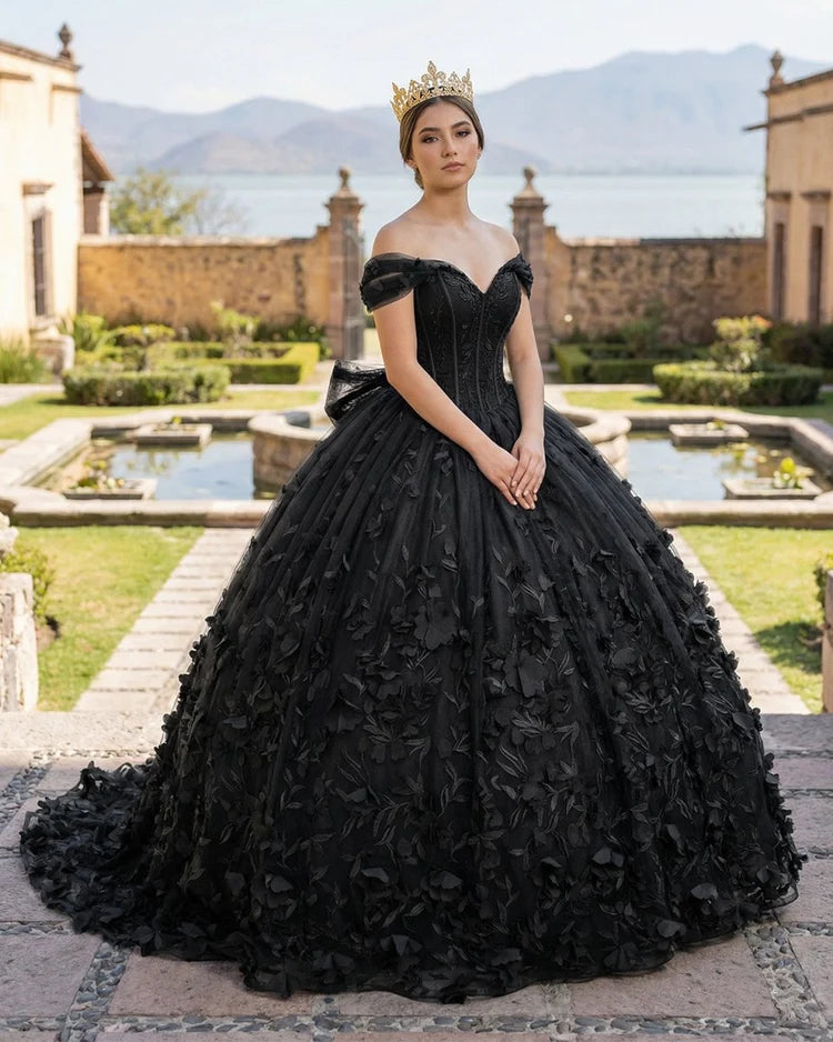 dramatic black off-the-shoulder ball gown with 3D floral appliqué and a matching black skirt