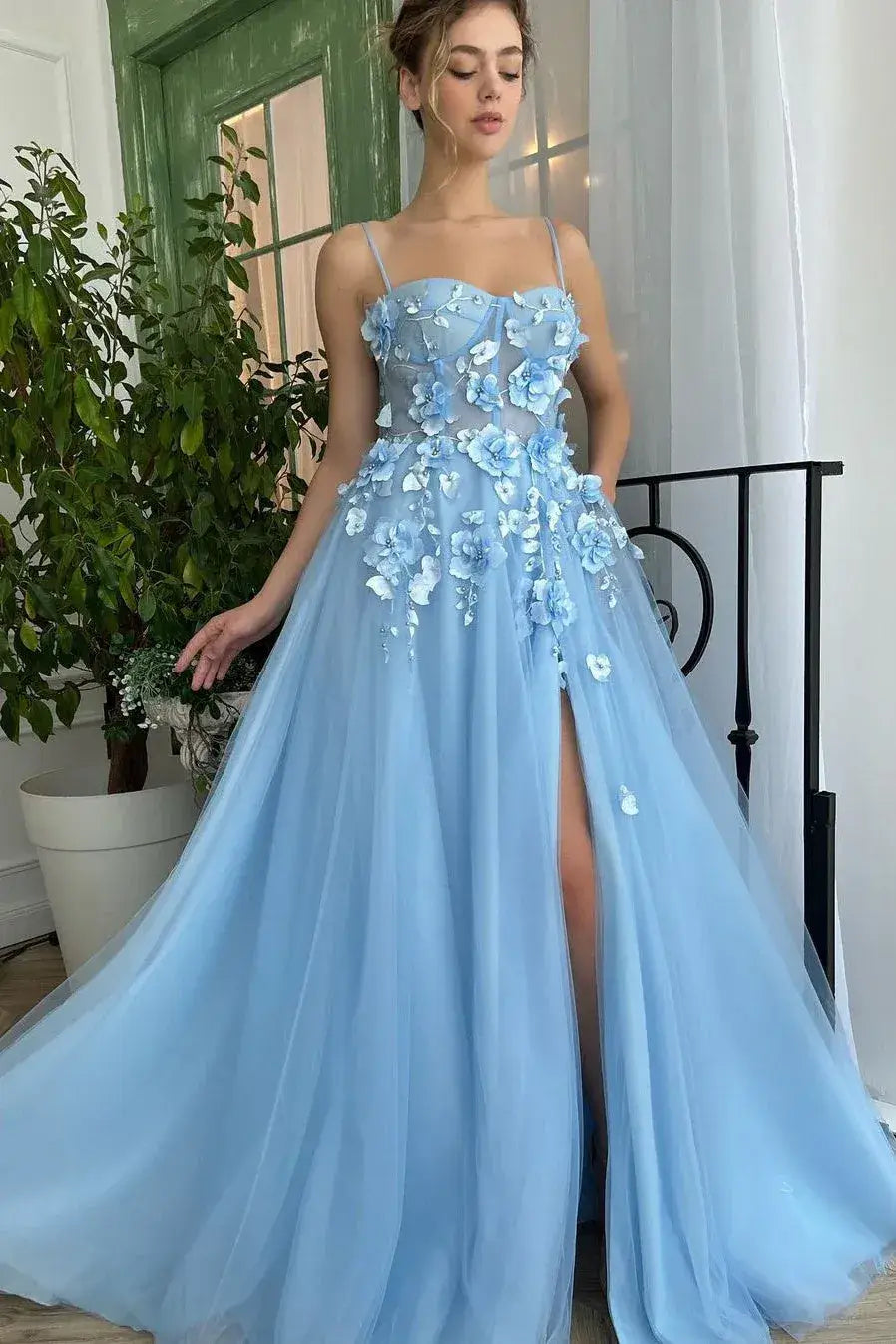 light blue evening gown with floral embellishments