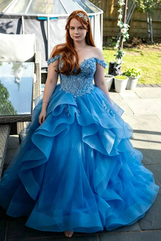 off-the-shoulder blue ball gown with a heavily embellished lace bodice