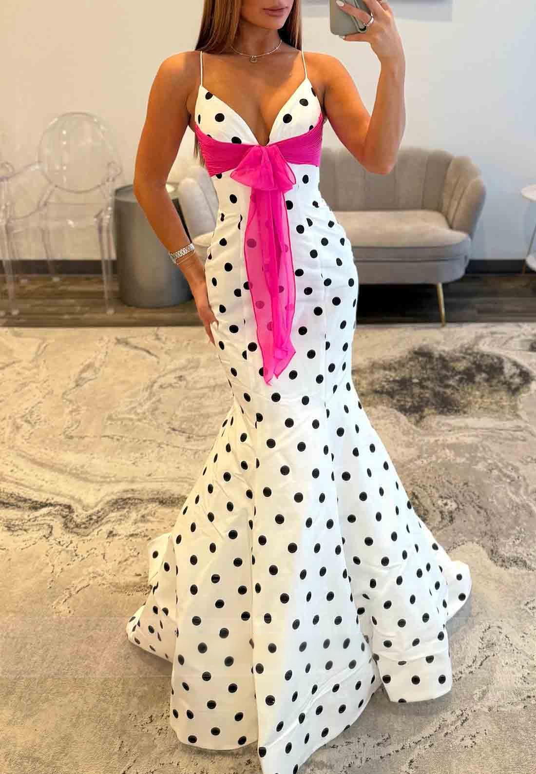 polka dot dress with a pink bow
