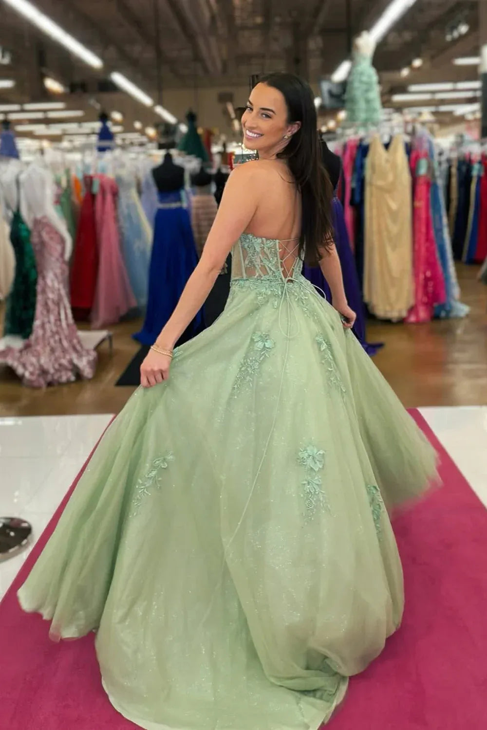 mint green ball gown with floral embroidery