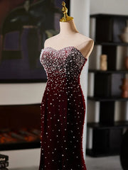 Red evening gown with beading