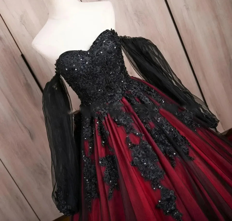 Red and black wedding gown with intricate lace detailing