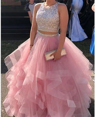 Pink two-piece formal gown with beaded top and ruffled skirt
