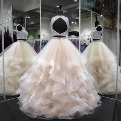 Elegant two-piece quince dress with a sparkling top and ruffled skirt