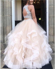 champagne 2 piece Prom dress with a beaded top and ruffled skirt 