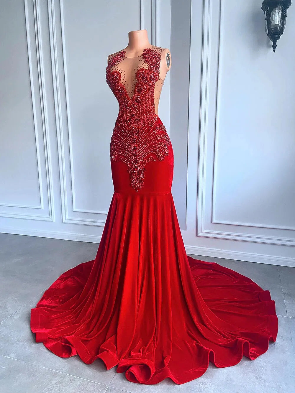 Red evening gown with intricate beading