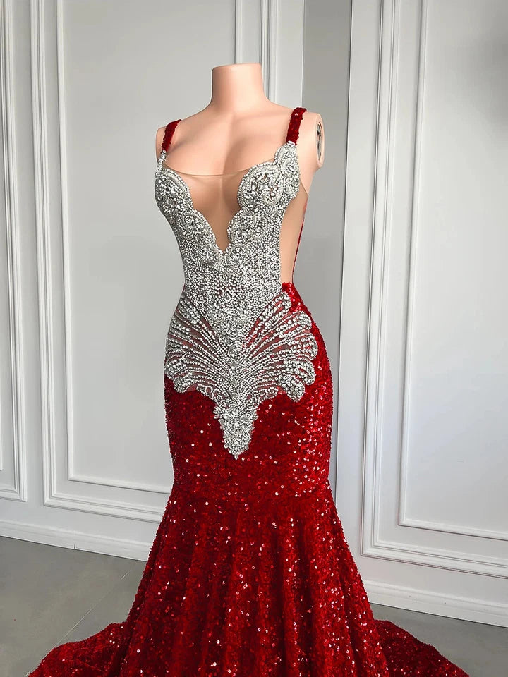 Red evening gown with silver embellishments