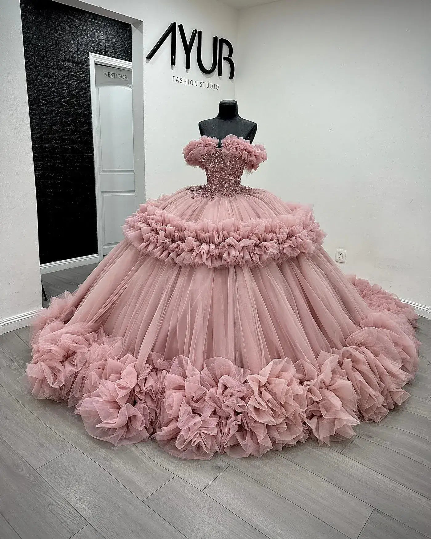 Puffy Pink Ruffled Quinceañera Dress with Sequins Beaded Sweet 15