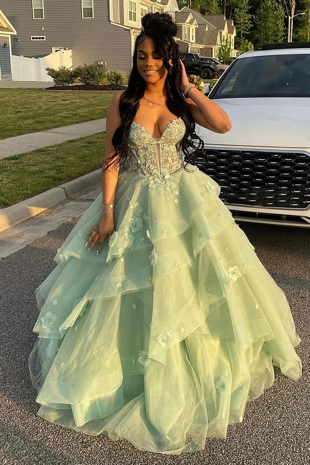 Woman in a light green formal gown